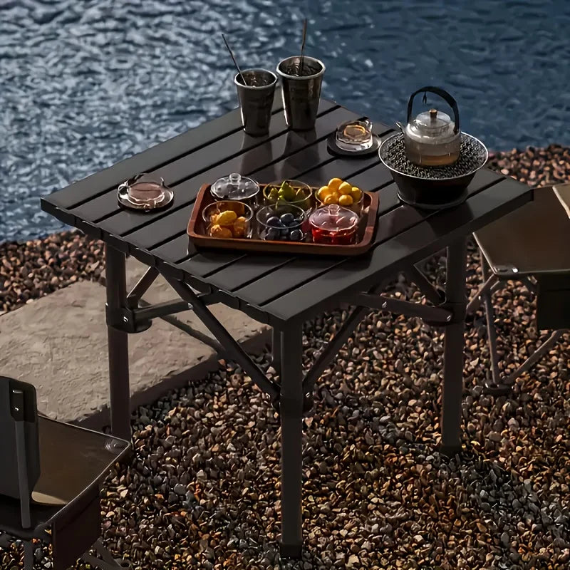Portable stainless steel folding table, camping barbecue table - compact outdoor leisure thickened picnic equipment.